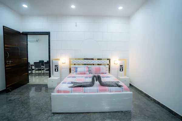 AC rooms and comfortable accommodation at Green Haven Sports Farm House