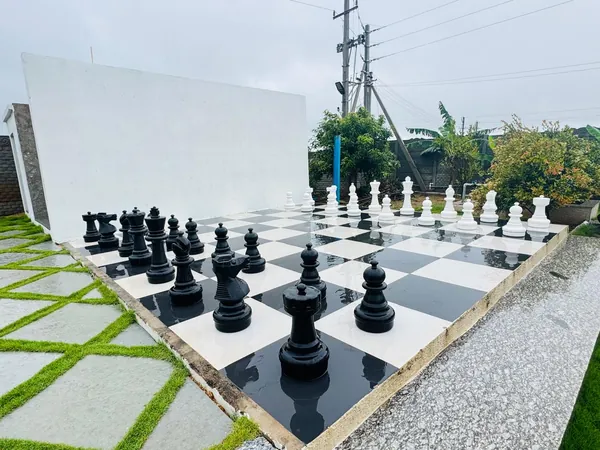 Giant garden chess and outdoor games at Green Haven Sports Farm House Hyderabad